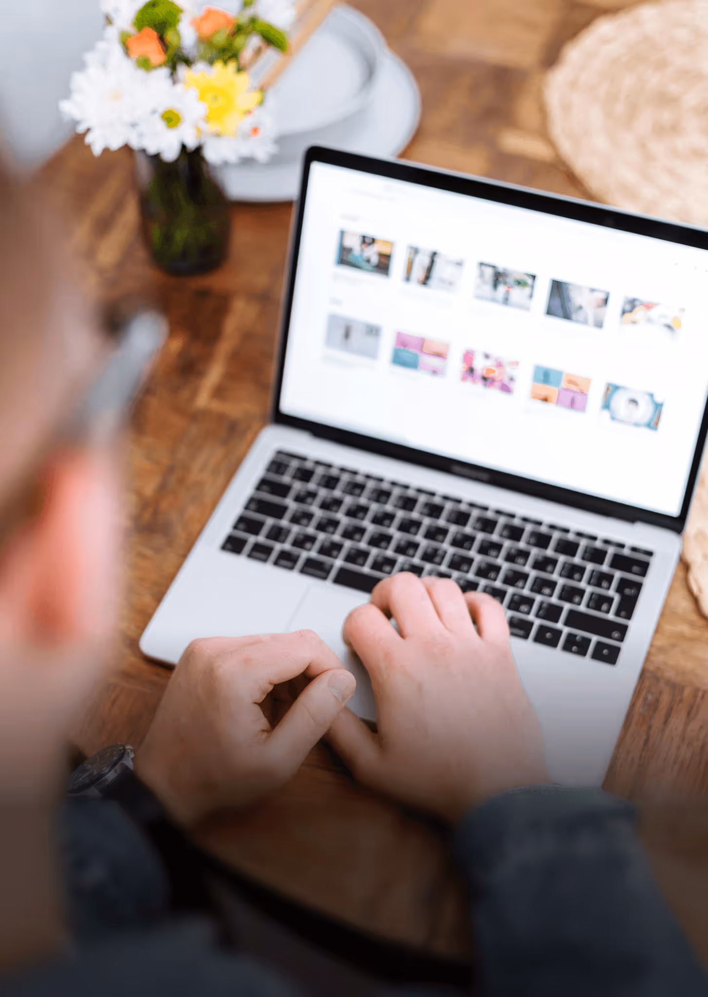 photo of someone working on a laptop